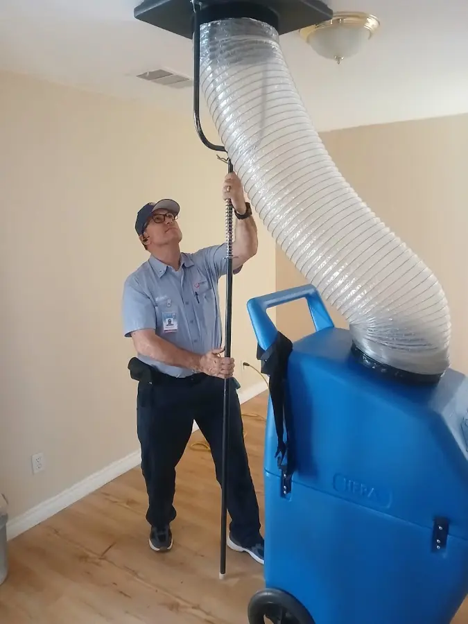 Furnace Tune-Up technician using HEPA equipment in Chestnuthill
